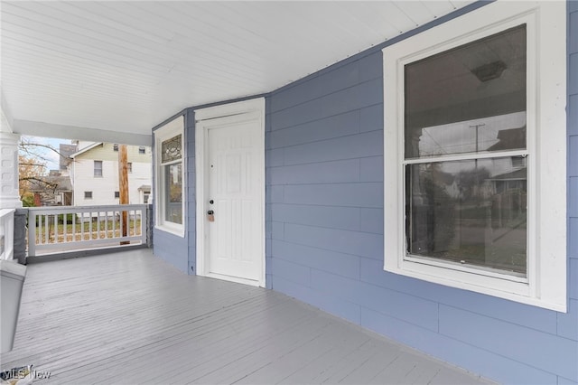 property entrance featuring covered porch