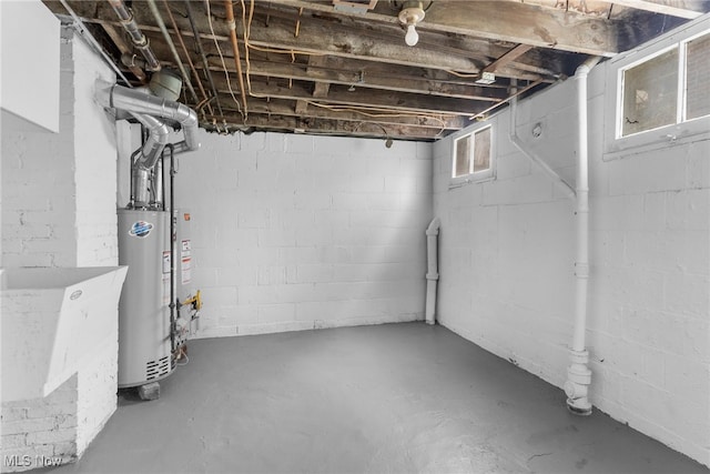 basement featuring gas water heater