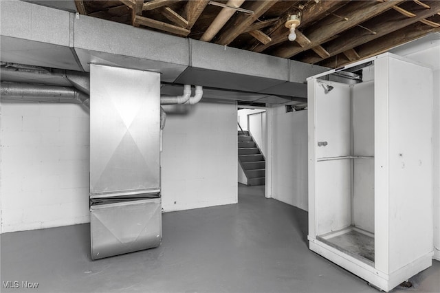 basement featuring heating unit