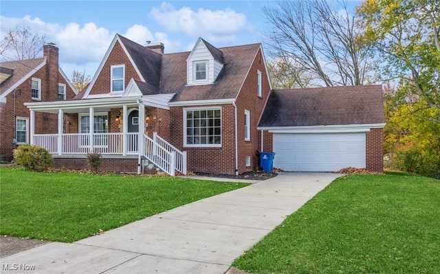 view of front facade featuring a garage, a porch, and a front yard