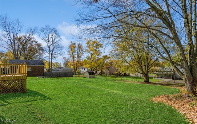 view of yard with a storage shed