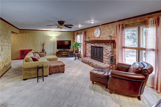 living room featuring a fireplace, light carpet, ceiling fan, and crown molding