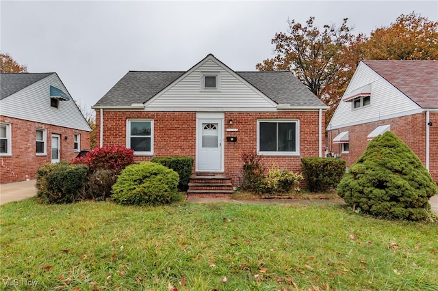 view of front of home with a front yard