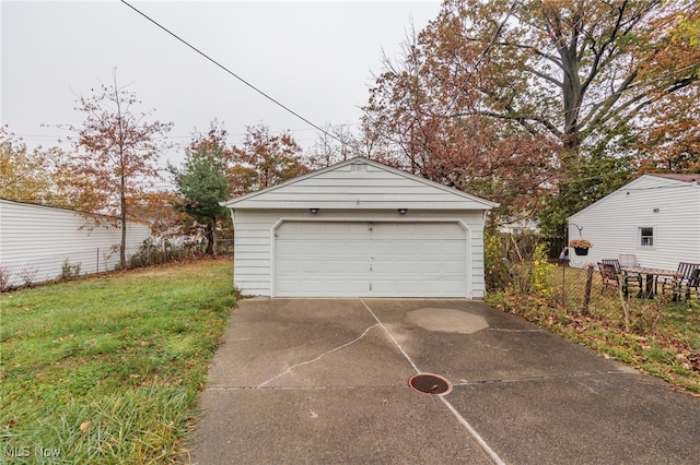 garage featuring a yard