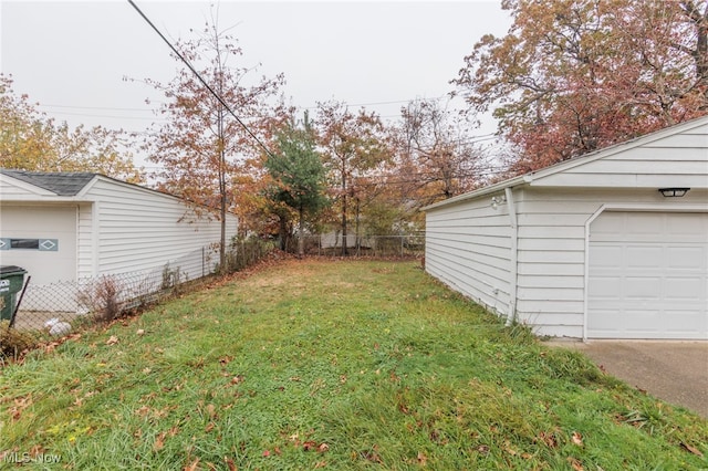 view of yard featuring a garage