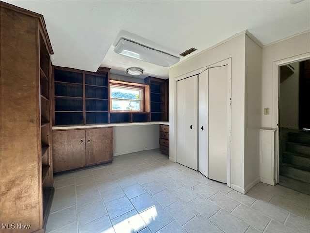 unfurnished bedroom featuring a closet