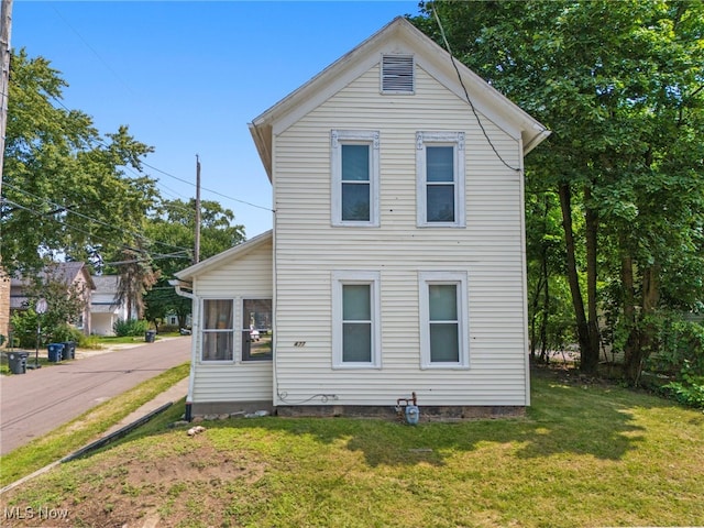 exterior space with a yard