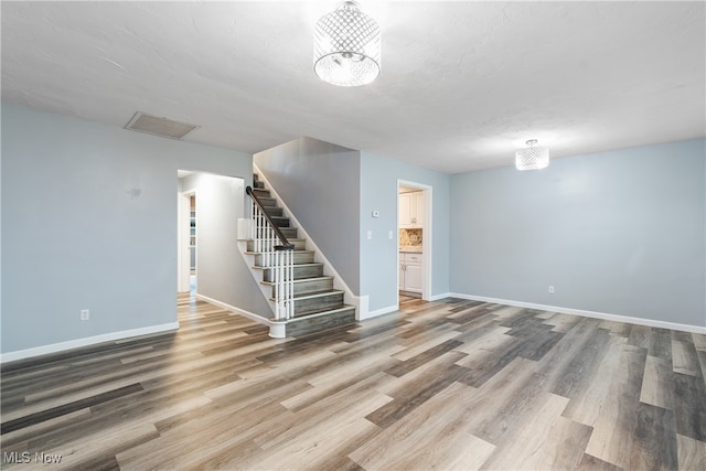 basement featuring wood-type flooring