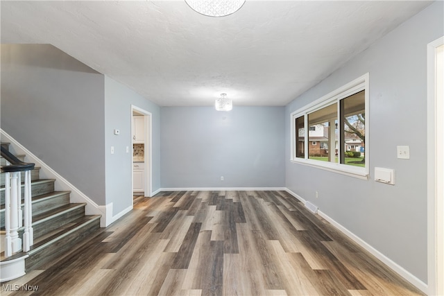 interior space with dark hardwood / wood-style floors