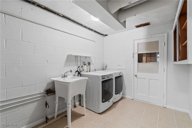 laundry area featuring washing machine and dryer