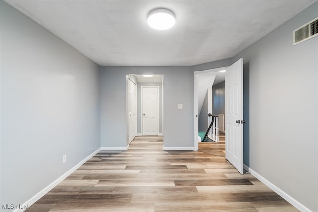 empty room featuring light hardwood / wood-style floors