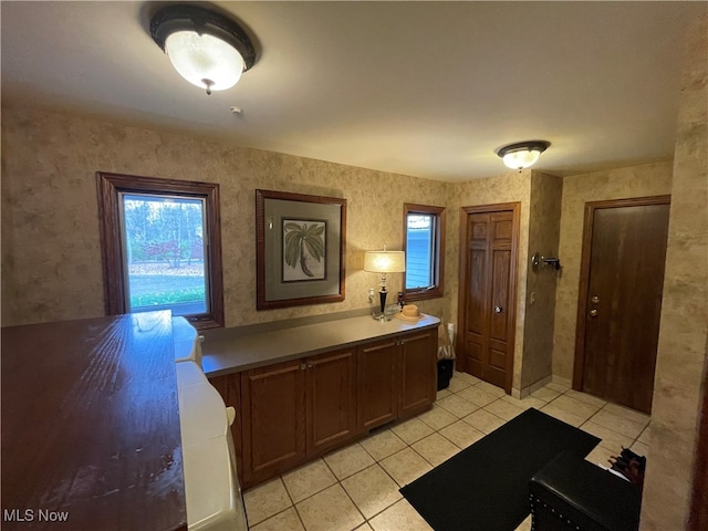 interior space featuring vanity and tile patterned flooring