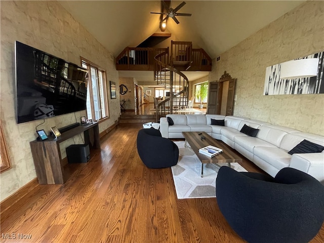 living room featuring high vaulted ceiling, wood-type flooring, and ceiling fan