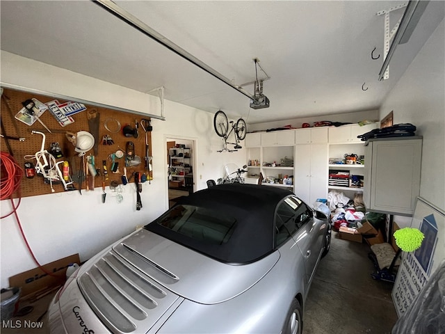 garage featuring a garage door opener