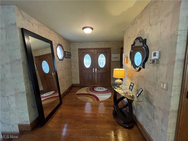 entrance foyer featuring dark wood-type flooring