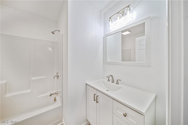 bathroom featuring vanity and tub / shower combination