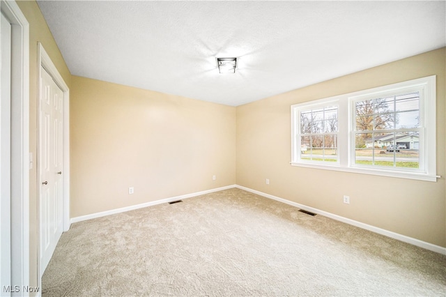 unfurnished bedroom with carpet floors