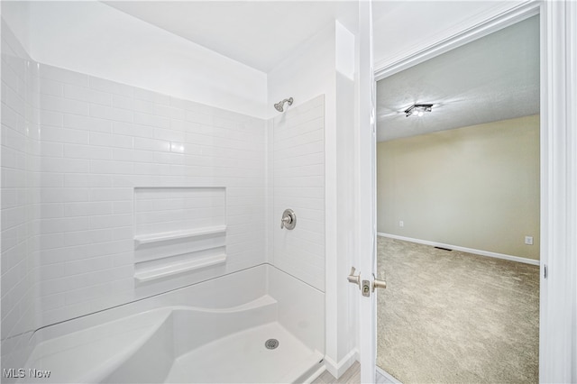 bathroom featuring walk in shower