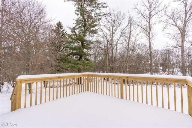 view of snow covered deck