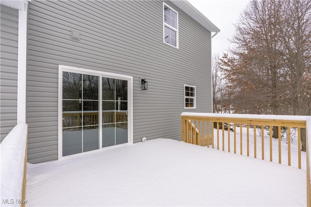 view of snow covered deck