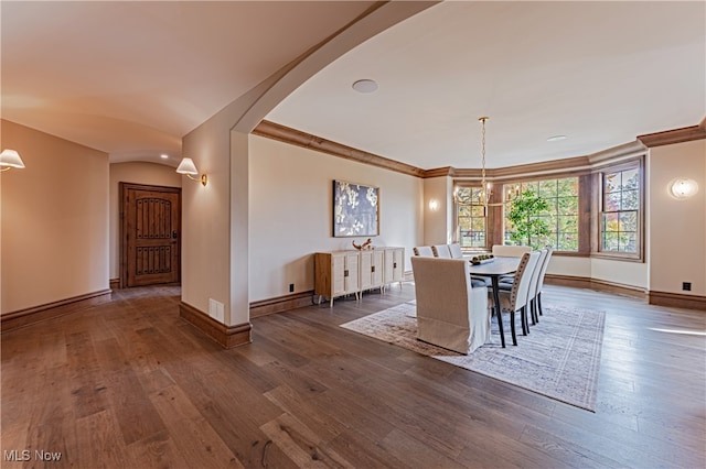 unfurnished dining area featuring dark hardwood / wood-style flooring