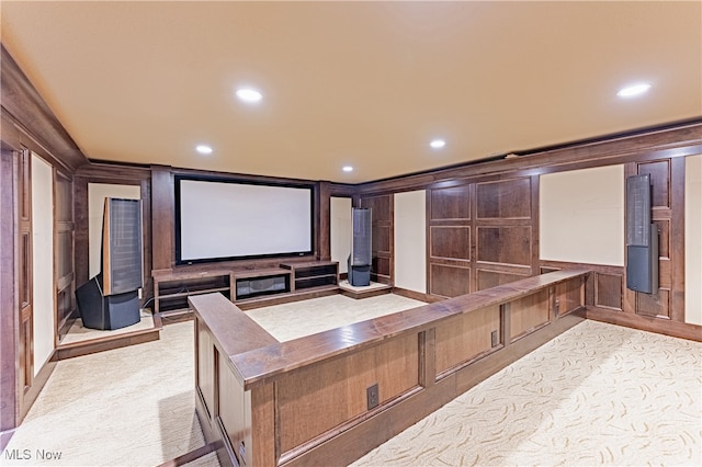 home theater with light colored carpet