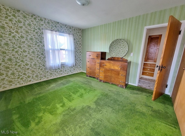 unfurnished bedroom with carpet floors