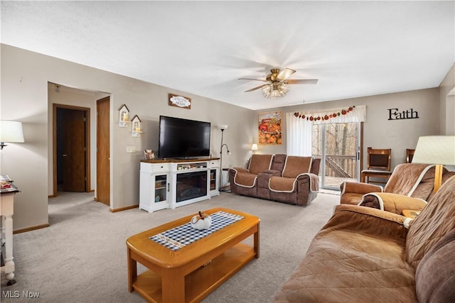 1284 Laurel Dr, West Salem, OH 44287 - living area with light colored carpet, a ceiling fan, and baseboards