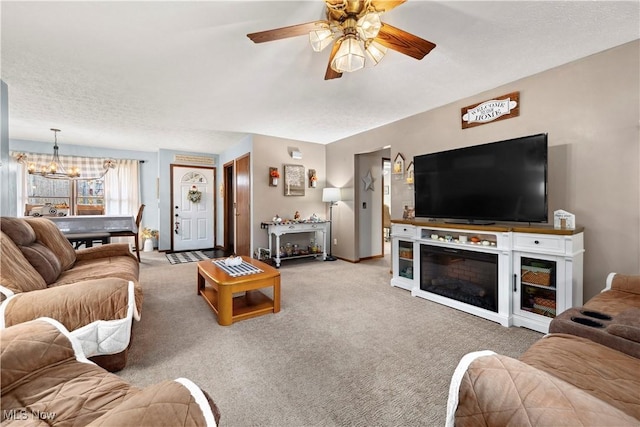 1284 Laurel Dr, West Salem, OH 44287 - carpeted living area featuring ceiling fan and a chandelier