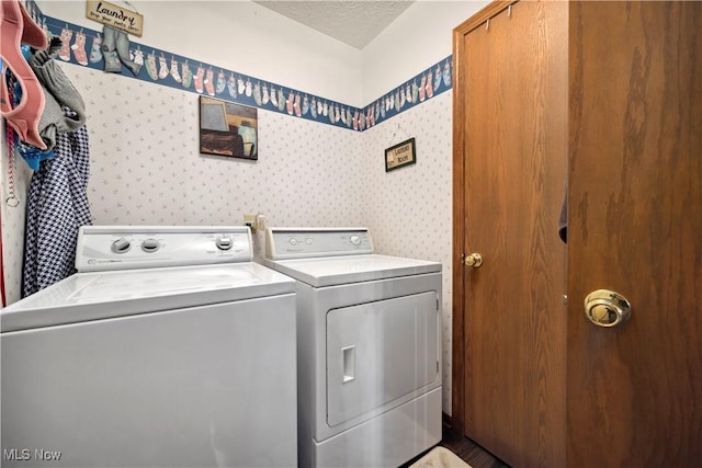 1284 Laurel Dr, West Salem, OH 44287 - laundry area featuring washer and clothes dryer, wallpapered walls, and a textured ceiling