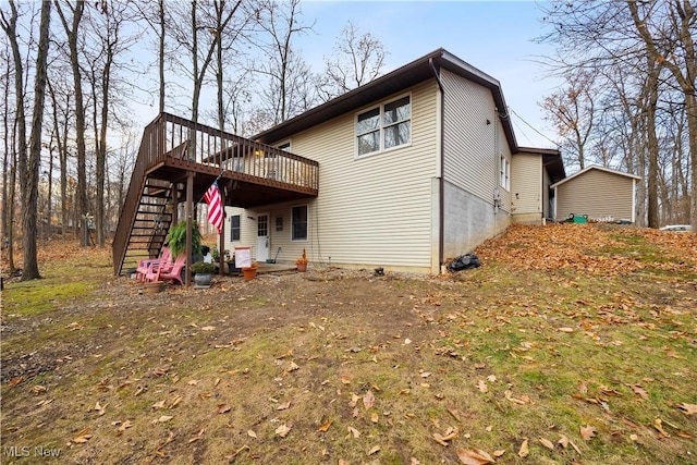 1284 Laurel Dr, West Salem, OH 44287 - rear view of house featuring a deck and stairs