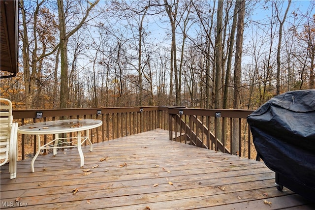 wooden deck with area for grilling