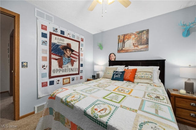 bedroom featuring ceiling fan and carpet floors