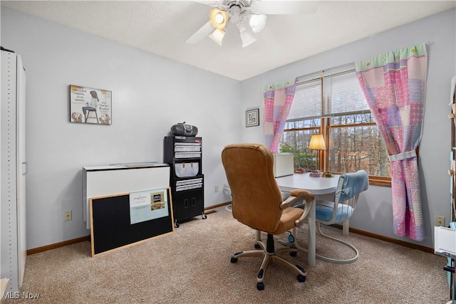 carpeted office with ceiling fan