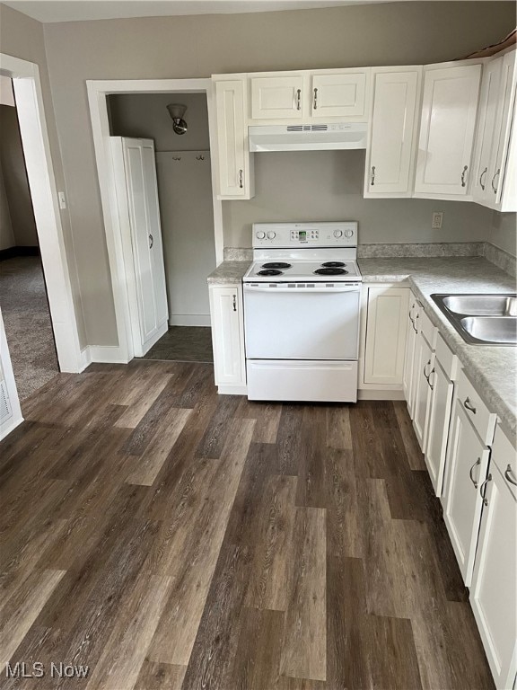 kitchen with white cabinetry, sink, white electric range oven, and dark hardwood / wood-style floors