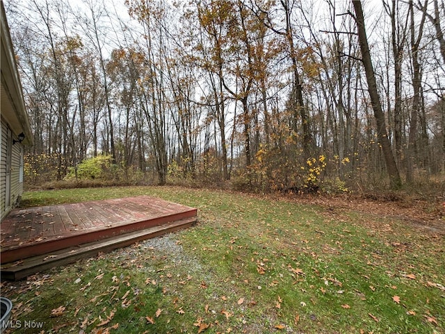 view of yard featuring a deck