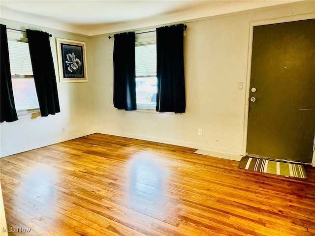 empty room with light wood-type flooring