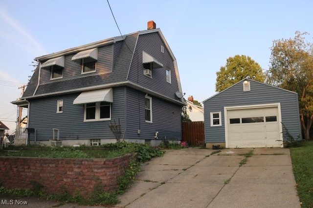 view of property exterior featuring a garage