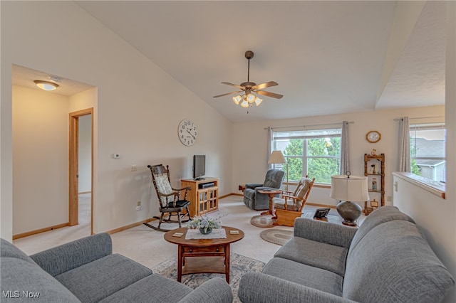 carpeted living room featuring lofted ceiling and ceiling fan