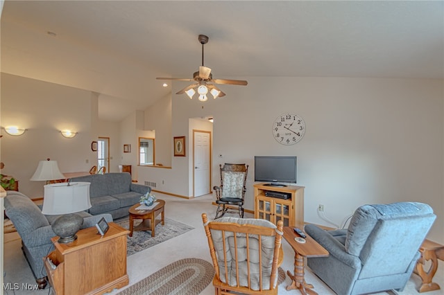 living room featuring ceiling fan, light carpet, and high vaulted ceiling