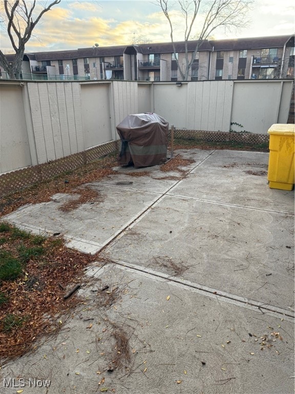 patio terrace at dusk with grilling area