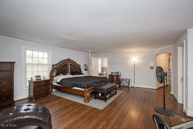 bedroom featuring dark wood-type flooring