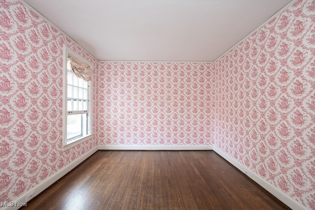 empty room featuring hardwood / wood-style flooring