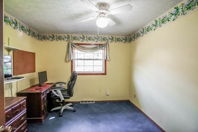 office with carpet, a textured ceiling, and ceiling fan