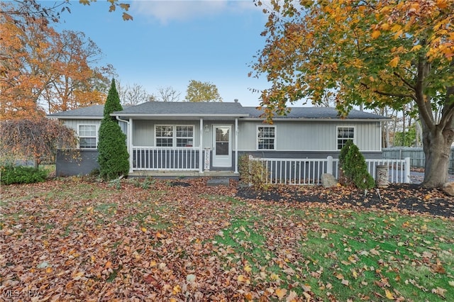 ranch-style home featuring a porch