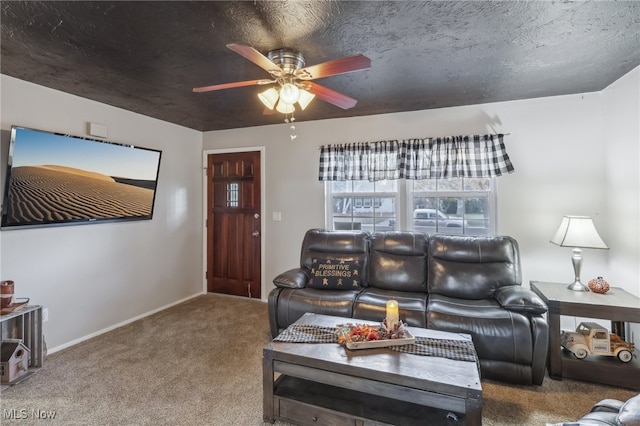 living room featuring ceiling fan and carpet flooring