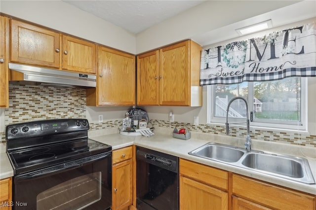 kitchen featuring backsplash, sink, and black appliances