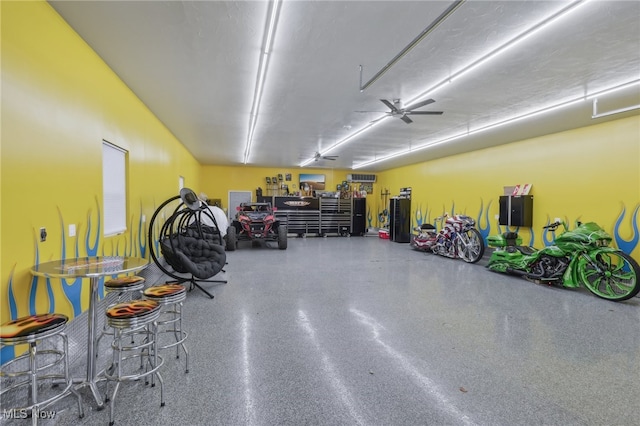 garage with ceiling fan