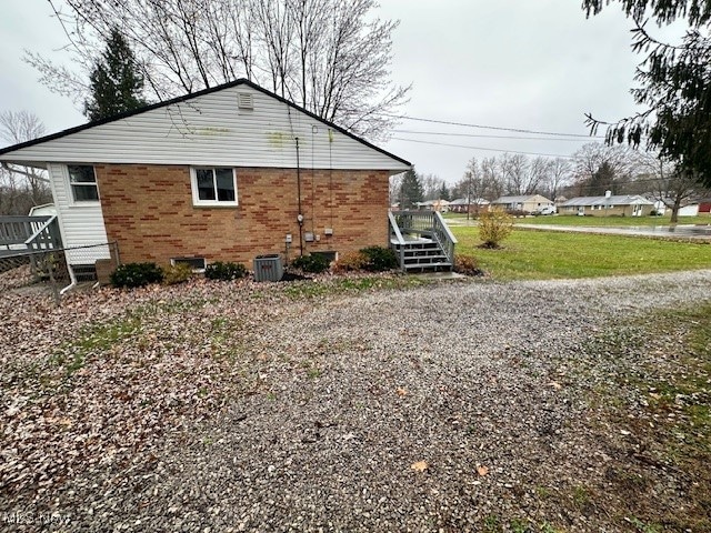 view of property exterior with central air condition unit