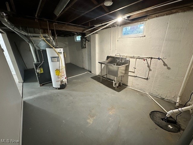 basement with sink and gas water heater